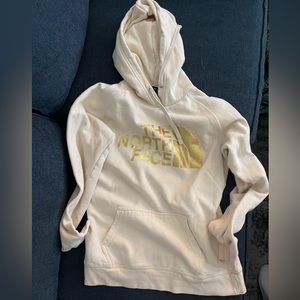 North face cream and gold hoodie.  Size XS or Small, no size.